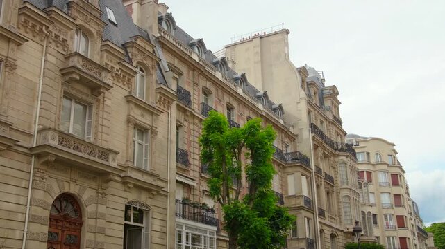 Classic parisian apartment buildings with traditional architecture and stone facades.