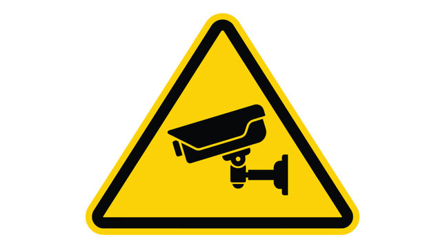 A bright yellow triangular safety sign featuring a black surveillance camera vector graphic design icon