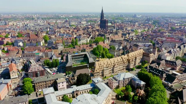 Strasbourg, France. The historical part of the city, Strasbourg Cathedral. Drone footage, Departure of the camera