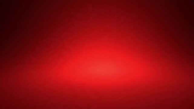 Abstract red background with a central glowing light source
