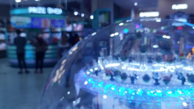 Blurred Defocused Arcade Game Center with Colorful Neon Lights and Claw Machines Background, Bokeh Entertainment Backdrop