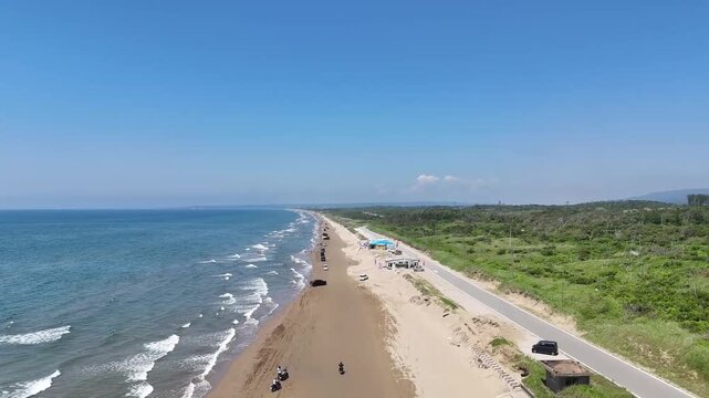 The Endless Road - Cinematic aerial view of freedom and adventure along the scenic sandy coast of Chirihama, Japan