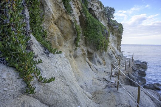 Road along the coast with beautiful rock formations to, Capo Sant Andrea, Marciana, Livorno Province, Italy