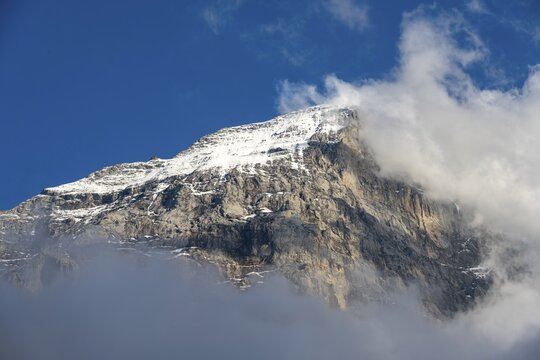 Mountain peak with moving clouds, Bernese Alps, Bernese Oberland, Switzerland