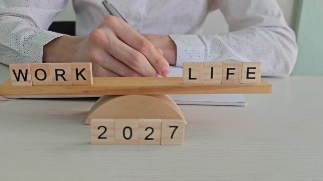 Balancing work and life in 2027 with wooden blocks