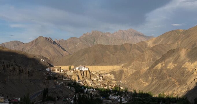 Lamayuru, India: Time lapse of the sunset over the village and famous Tibetan Buddhism Lamayuru monastery or Yuru Gompa in Ladakh Himalayan mountains in India. 