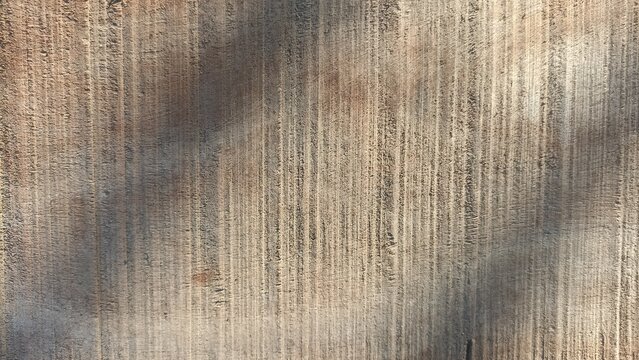 Wood Texture Background featuring a warm brown weathered wooden surface with vertical grain, ideal for rustic designs, interior concepts, packaging, and natural backdrops