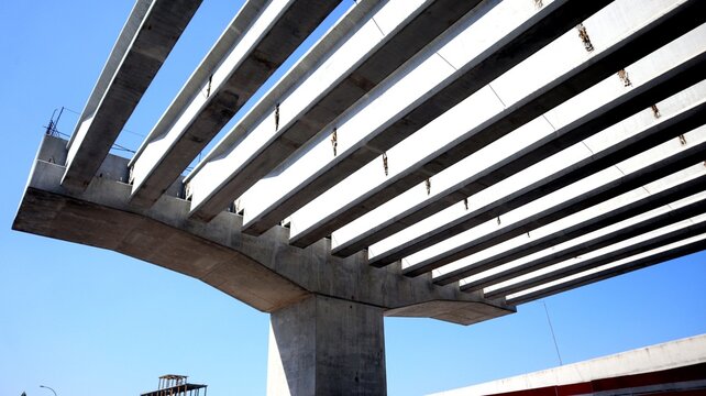 Horizontal concrete pillars. The concrete construction forms beautiful, bold lines. Great for your design.