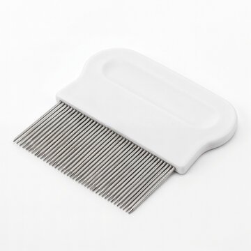 Generic pet flea and tick fine tooth comb isolated on white.