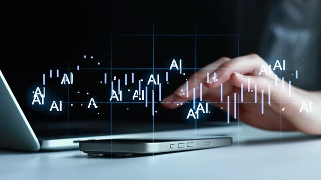 A person is focused on their laptop while using a smartphone. Digital data about AI appears on the screen. The setting is dark, suggesting late night work.