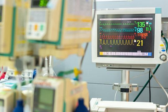 Hospital patient monitor displaying vital signs intensive care unit supporting emergency treatment clinical monitoring healthcare technology medical safety