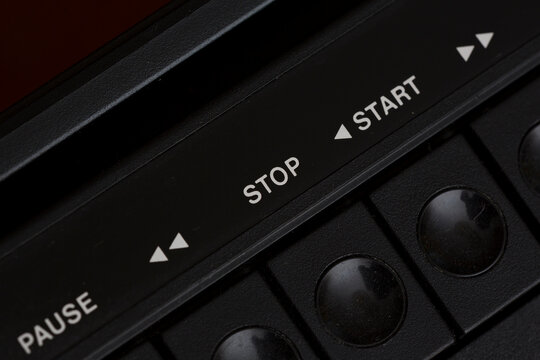 Radio buttons of an analog cassette player. Retro image of old times. Rec, stop, pause buttons on an old retro radio.