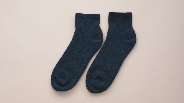 Dark socks isolated on white background clean studio style creating neat visual for commercial use