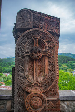 Ancient carved stone cross khachkar in Armenia with copy space