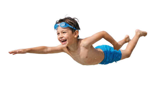 Happy young boy swimming with blue goggles, cheerful child diving in mid-air pose, active kid in blue swim trunks isolated on white background