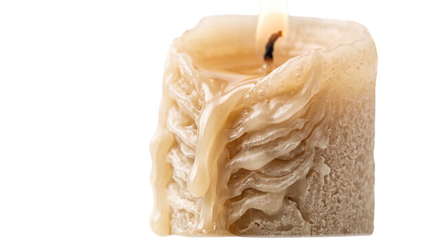 Rustic textured candle with melting wax drips, burning beige pillar candle on white background, atmospheric warm light for spa and wellness