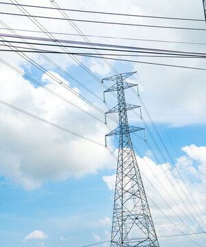 High voltage electric pole power line electric transmission tower background, technology energy clean ecosystem change green environment, substation construction pylon generator grid electricity.