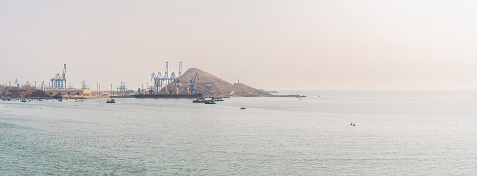 Chancay Port panoramic container terminal and industrial harbor in Peru with Pacific Ocean copy space