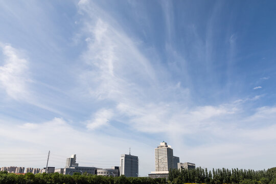 Suburban buildings and clouds in the sky