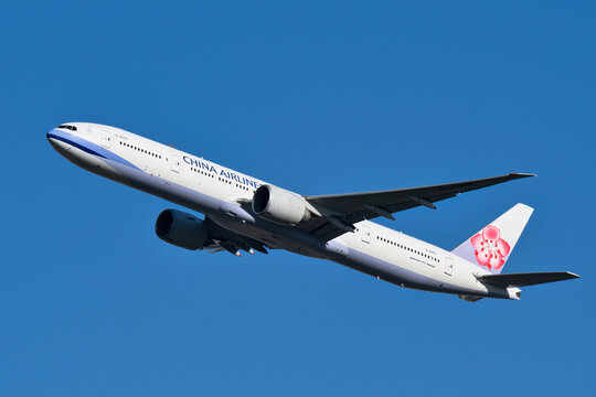 China Airlines Boeing 777-300ER (B-18003) passenger plane climbing after takeoff at Narita International Airport