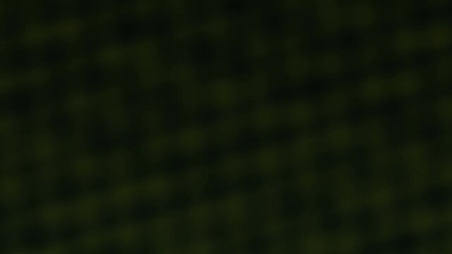 Abstract seamless looping background pattern with soft focus and deep green gradients suitable for design projects.