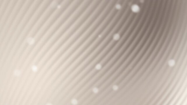 Abstract wavy cream surface texture light spots bright bokeh blurred neutral background.