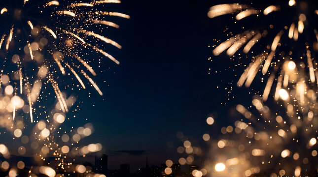 Golden fireworks bursting over city skyline at night for New Year celebration background