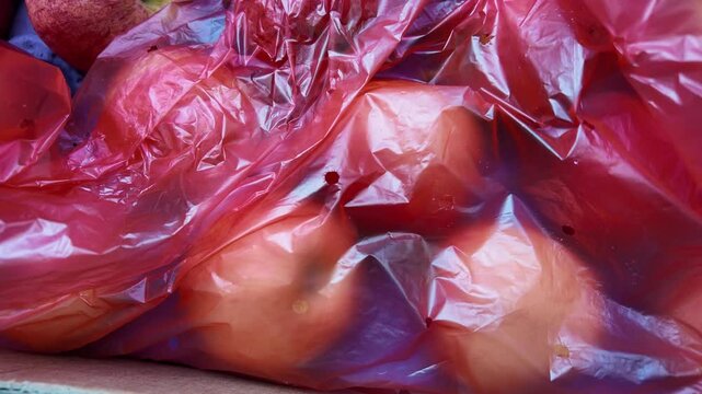 fresh red apples opening in fruit market , slow mo cinematic view of apples from box