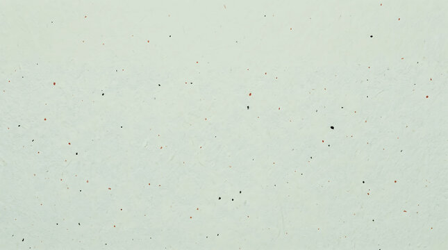 Paper texture featuring a soft pastel lavender handmade fiber surface with delicate burgundy and black flecks for premium backgrounds