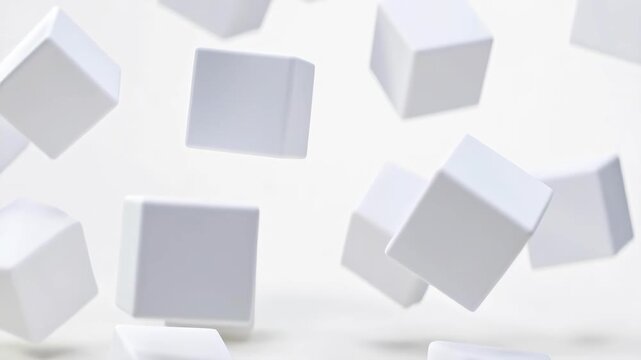 White geometric cubes floating in clean minimalist style on bright background, symbolizing modern abstraction and simplicity