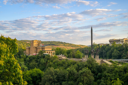 Golden hour view of the State Art Gallery Boris Denev and Monument to the Assen Dynasty in Veliko Tarnovo Bulgaria