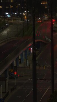 Traffic timelapse city highway night car light trails. Long exposure timelapse video showing abstract streaks of red and white car lights on a busy multi-lane highway