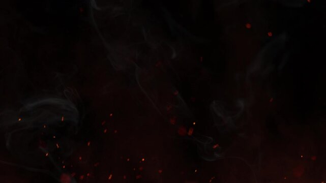 Super Slow Motion Shot of Flying Fire Sparks and Smoke Isolated on Black Background at 1000fps.