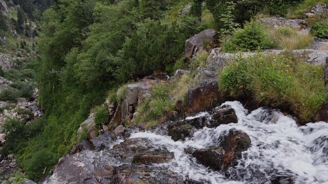 Close-up view of rushing water cascading over rocks at Elbe Waterfall in Krkonose National Park, Czech Republic