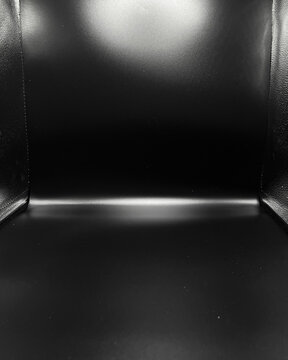 Empty black studio lightbox background with gradient lighting