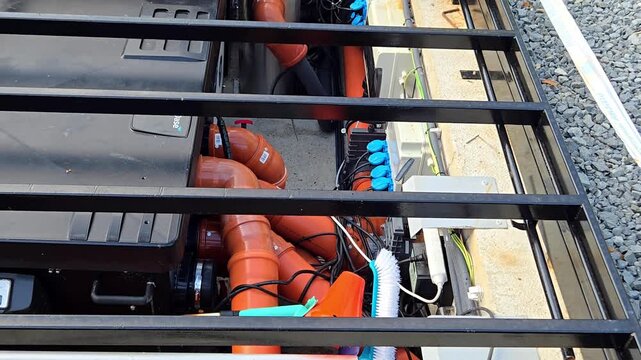 Pool filtration system and technical equipment installation with PVC pipes and pumps
