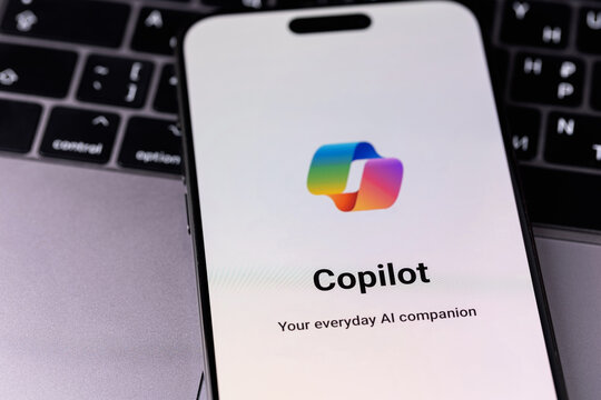 Microsoft Copilot mobile logo app on a screen smartphone iPhone. Microsoft Copilot is an artificial intelligence assistant for Microsoft 365 apps and services. Batumi, Georgia - June 12, 2026