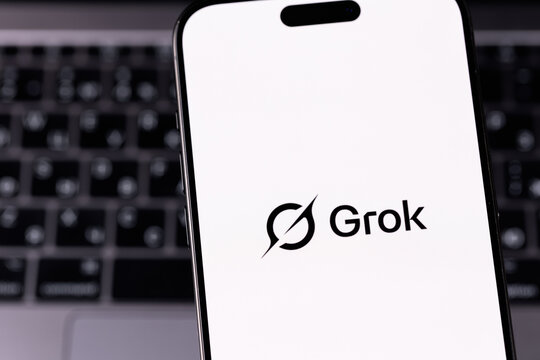 Grok logo mobile app on a screen smartphone iPhone closeup. Grok is a generative AI-powered chatbot developed by xAI. Batumi, Georgia - June 12, 2026