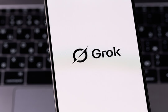 Grok logo mobile app on a screen smartphone iPhone. Grok is a generative AI-powered chatbot developed by xAI. Batumi, Georgia - June 12, 2026