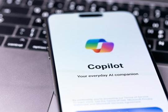 Microsoft Copilot logo mobile icon app on a screen smartphone iPhone. Microsoft Copilot is an artificial intelligence assistant for Microsoft 365 apps and services. Batumi, Georgia - June 12, 2026