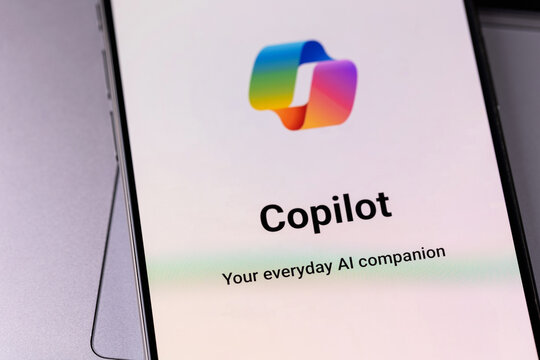 Microsoft Copilot logo mobile app on a screen smartphone iPhone. Microsoft Copilot is an artificial intelligence assistant for Microsoft 365 apps and services. Batumi, Georgia - June 12, 2026