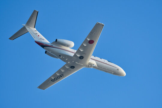 Ministry of Land, Infrastructure, Transport and Tourism Cessna Citation CJ4 flight inspection aircraft (JA012G) flying over Tokyo