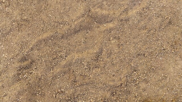 Top view of dry dirt and soil texture background