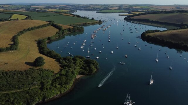 Aerial drone view of boat moorings in Salcombe Estuary, South Devon, England