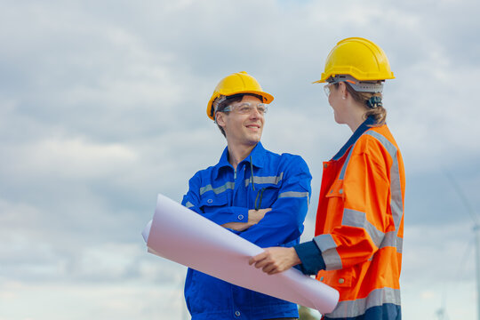Engineer team working outdoors with safety Site survey inspection, Working together outdoor teamwork