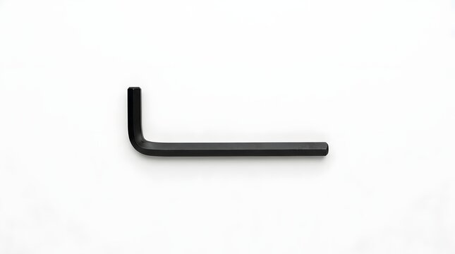 Black hex key tool lying on white background