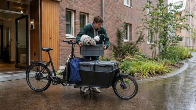 Student moving into residence with a cargo bicycle
