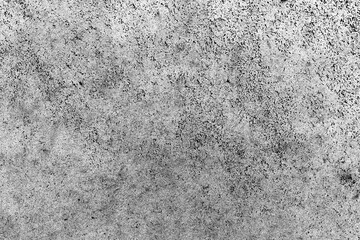 Distressed concrete texture shows cracks, dirt, and wear, creating a grunge and rough surface ideal for abstract backgrounds and overlay effects © Vero Dibe