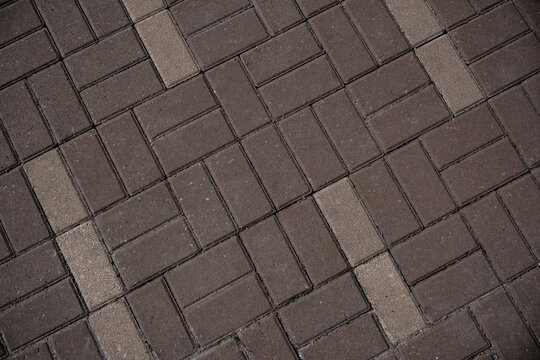 Interlocking concrete paving block texture background.