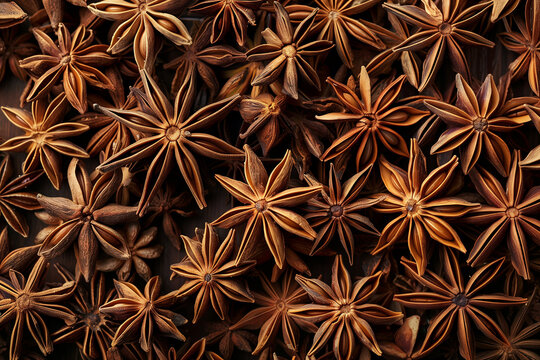 Pile of dried star anise spices texture background